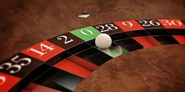 Live-dealer casino table with cards and chips